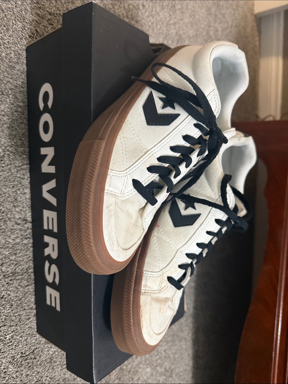 Converse Low Top Sneakers in White and Black with Gum Sole